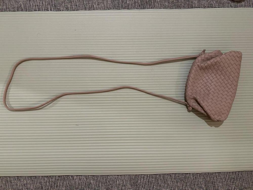 Customer image of Italian Leather Handwoven Pouch Crossbody Clutch