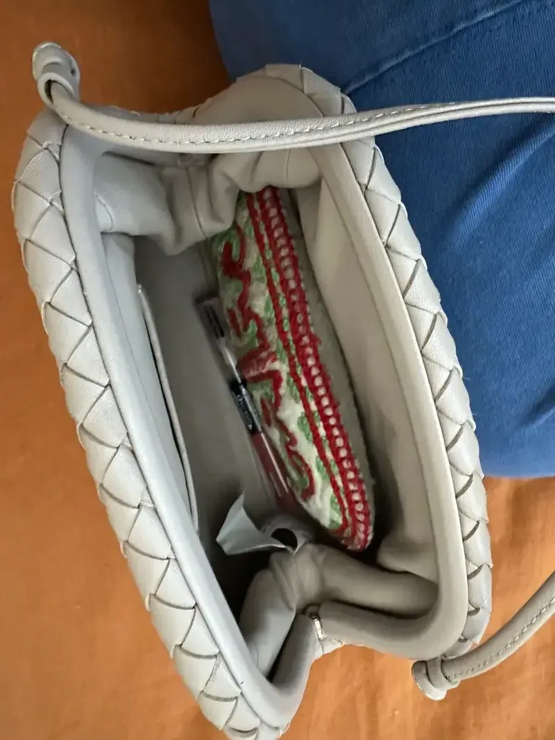 Customer image of Italian Leather Handwoven Pouch Crossbody Clutch