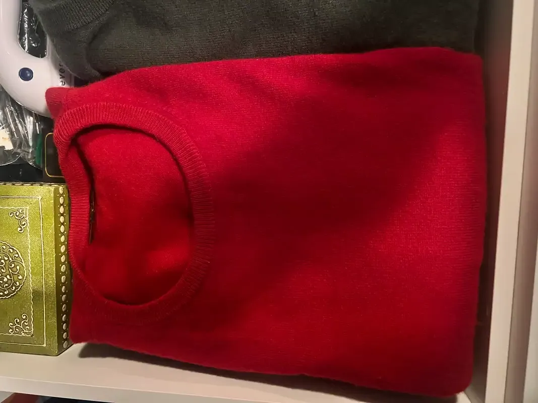 LOVE this sweater, especially in red. 